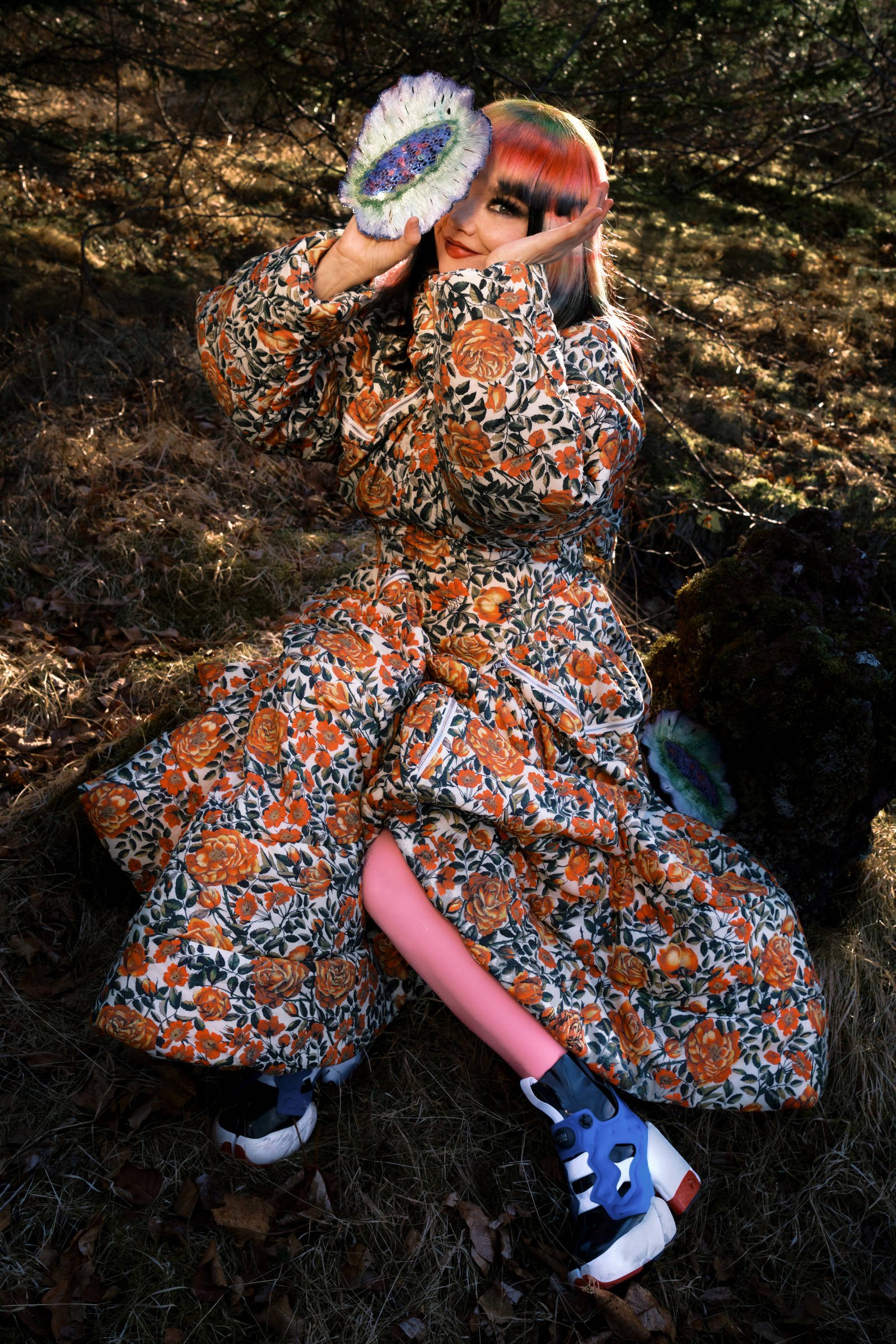 Björk holding the "Floaters" brooches I Photo by Vidar Logi I Styling by Edda Gudmundsdottir I Makeup by Sunna Björk I Dress by Kenzo I Wig by Tomihiro Kono