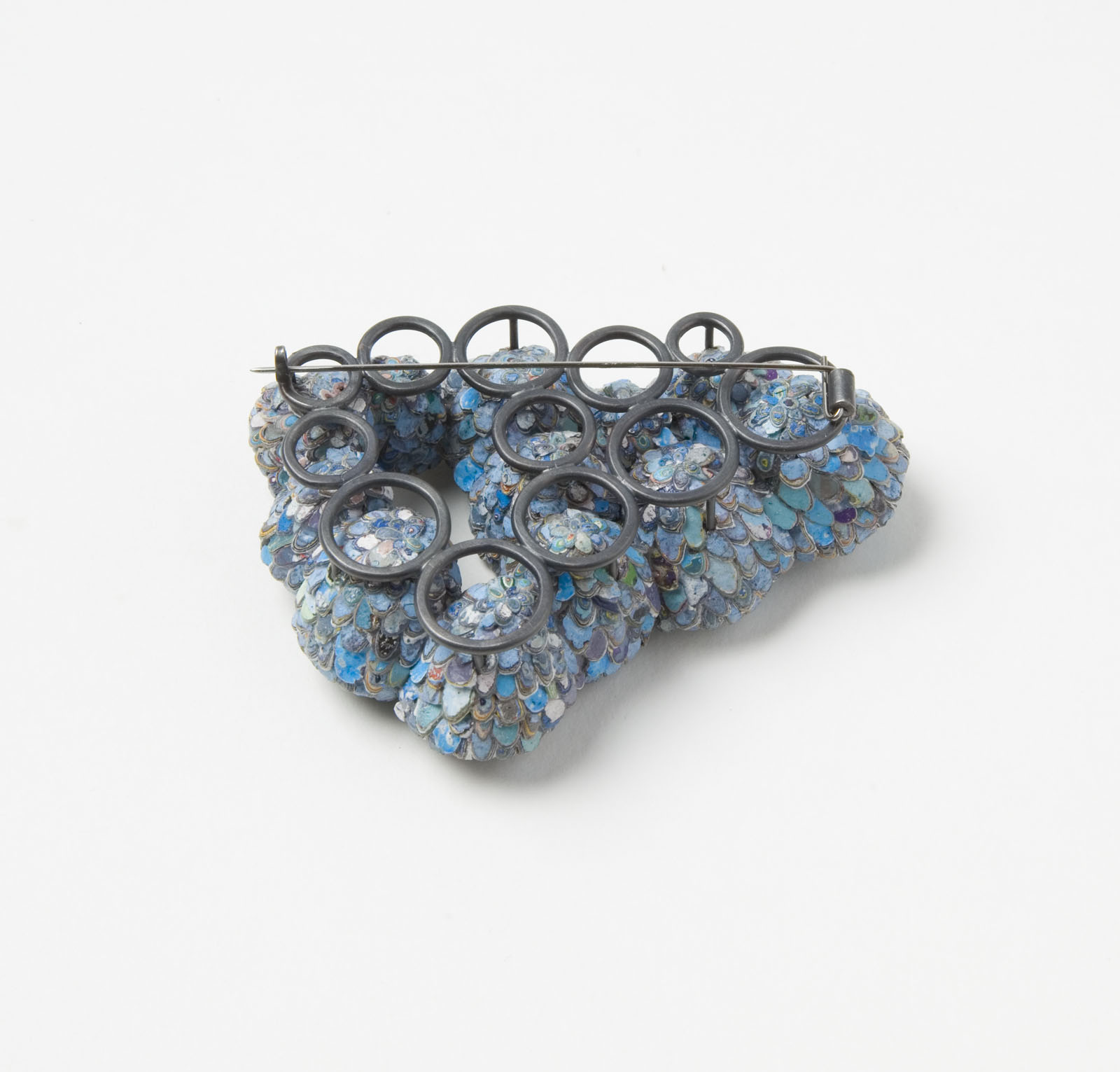"The Secret Keepers (Blue 1)" I Brooch, 2016 I Seed pods, graffiti, glass, silver, stainless steel I Photo: Mirei Takeuchi