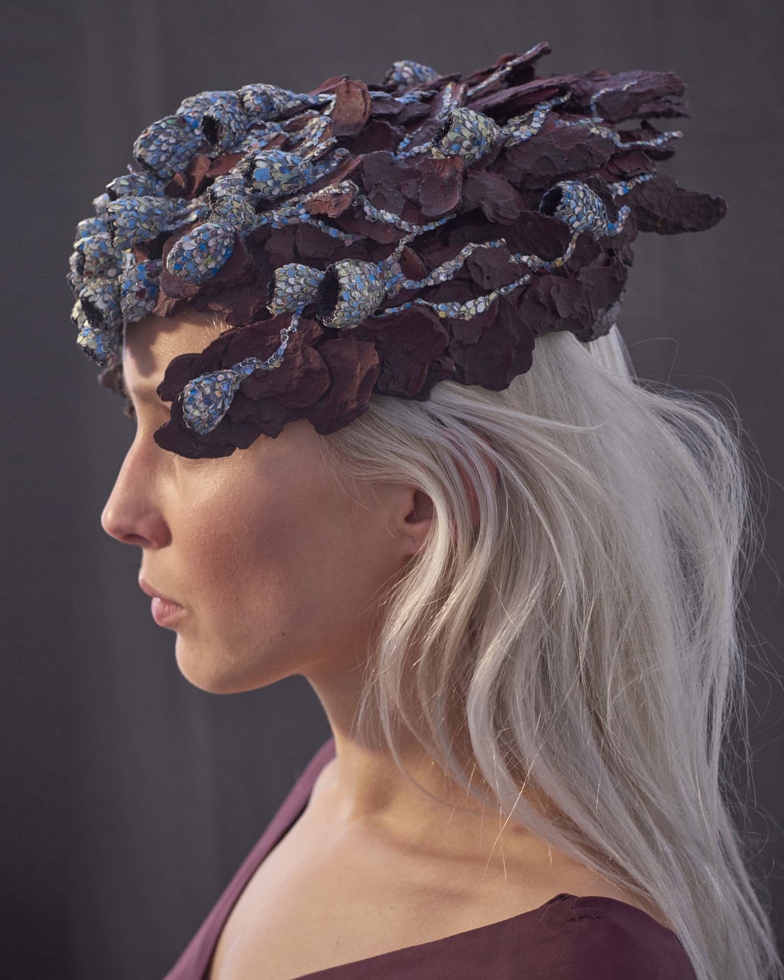 "In The Beginning There Was Red" I Headpiece, 2017 I Wood bark, graffiti, almond shells, glass, paint I Photo: Laurens Grigoleit